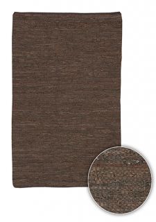 Handmade Mandara Leather Rug (9 X 13) (BrownPattern SolidMeasures 0.375 inch thickTip We recommend the use of a non skid pad to keep the rug in place on smooth surfaces.All rug sizes are approximate. Due to the difference of monitor colors, some rug col