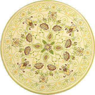 Hand hooked Bedford Ivory/ Green Wool Rug (4 Round) (IvoryPattern FloralMeasures 0.375 inch thickTip We recommend the use of a non skid pad to keep the rug in place on smooth surfaces.All rug sizes are approximate. Due to the difference of monitor color
